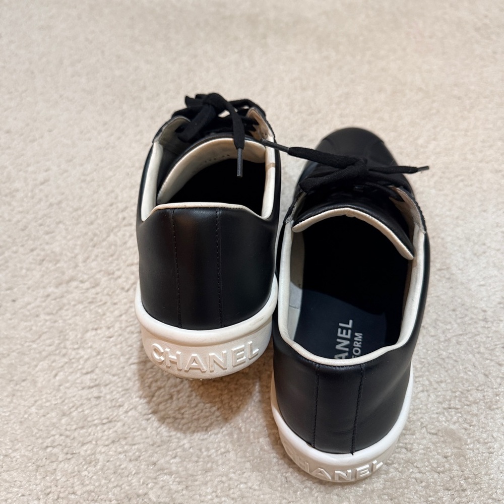 CHANEL Black Leather Low-Top Sneakers with White Sole Accent - Picture 12 of 14